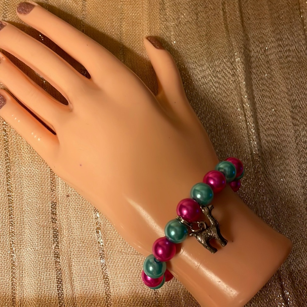 Teal and hot pink elastic beaded bracelet with alpaca charm